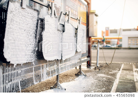 Car floor mats in foam, touchless car wash outdoor 45565098