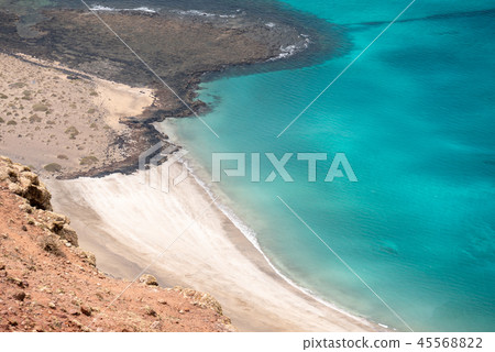 view of deserted beach from the mirador del rio 45568822