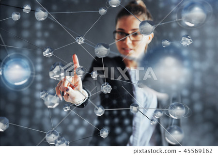 Modern technologies, Internet and network concept - man, presses the button on the virtual screen Modern technologies, Internet and network concept - man, presses the button on the virtual screen 45569162