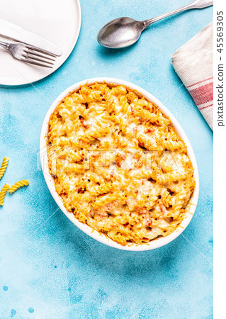 Mac and cheese, pasta baked with cheese sauce. 45569305