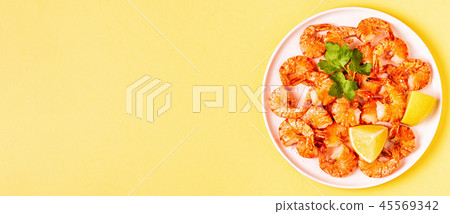 Grilled shrimps with lemon parsley and garlic Grilled shrimps with lemon parsley and garlic 45569342