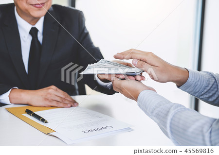 Bribery and corruption concept, bribe in the form of dollar bill 45569816