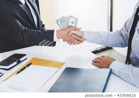 Bribery and corruption concept, bribe in the form of dollar bill 45569818