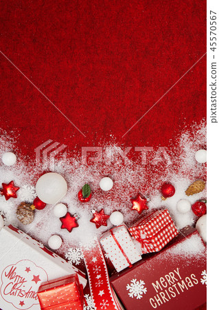 Christmas and New Year Decoration isolated on red Christmas and New Year Decoration isolated on red 45570567