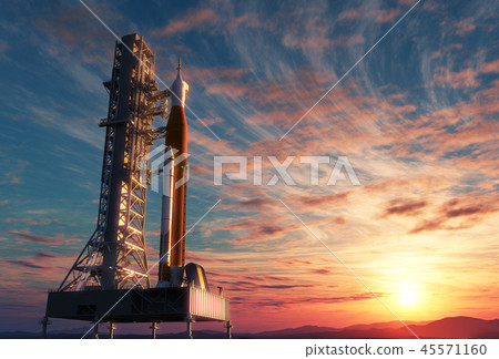 Space Launch System On Launchpad Over Background Of Sunrise Space Launch System On Launchpad Over Background Of Sunrise 45571160