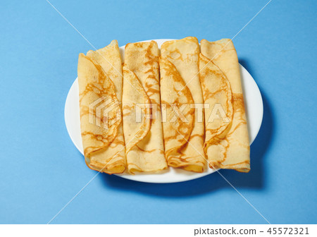 Crepe closeup, heap of thin pancakes on a dish 45572321