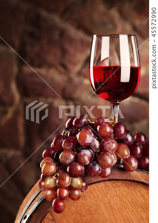 Red wine.Still life with glass of red wine, grapes 45572990