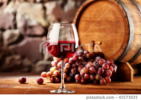 Red wine.Still life with glass of red wine, grapes 45573035