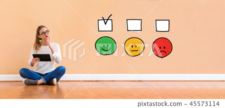 Survey with woman using a tablet Survey with woman using a tablet 45573114