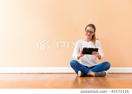 Young woman with a tablet computer 45573116