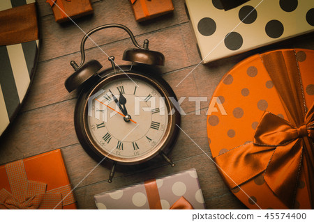 Vintage clock on christmas background Vintage clock on christmas background 45574400
