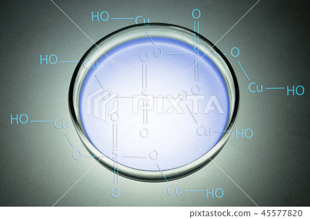 Abstract of petri dishes containing copper sulfate solution. Abstract of petri dishes containing copper sulfate solution. 45577820