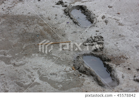 print of foot in wet cement and rain water print of foot in wet cement and rain water 45578842