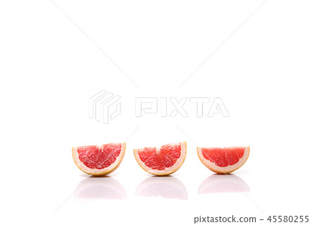 Grapefruit sliced isolated in white background Grapefruit sliced isolated in white background 45580255