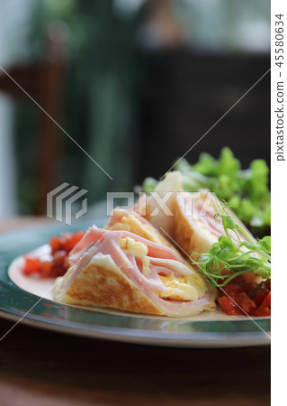 Breakfast burrito ham and eggs with salad vintage style 45580634