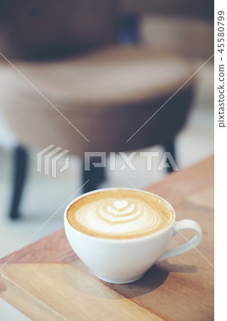 cappuccino or Latte art coffee made from milk on the wood table in coffee shop cappuccino or Latte art coffee made from milk on the wood table in coffee shop 45580799