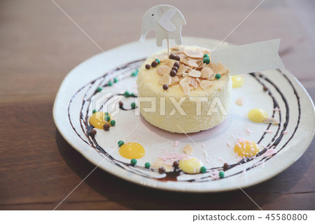 Japanese cheese cake on wood background 45580800