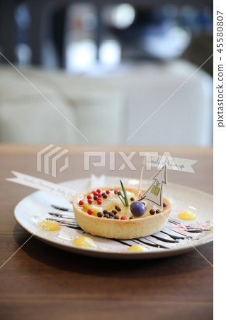 Lemon tart pie topping with chocolate ball sweet dessert on wood background 45580807