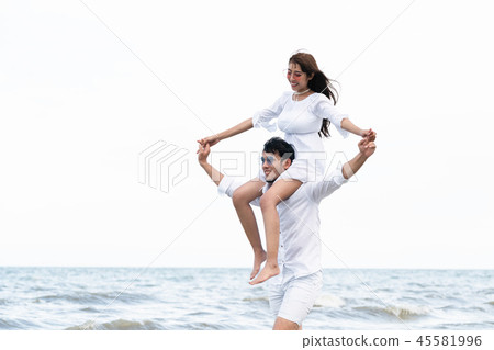 Couple going honeymoon on tropical beach in summer 45581996