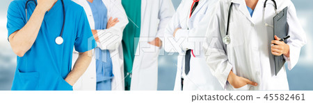 Doctor working in hospital with other doctors. 45582461