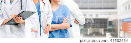 Doctor working in hospital with other doctors. 45582464