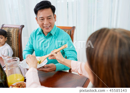 At family dinner At family dinner 45585143