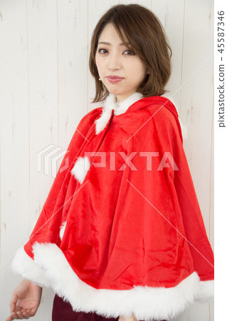 A woman in Santa costume 45587346