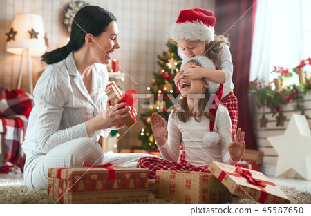 family celebrating Christmas family celebrating Christmas 45587650