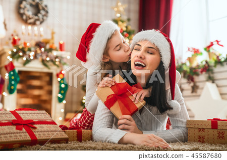 family celebrating Christmas family celebrating Christmas 45587680