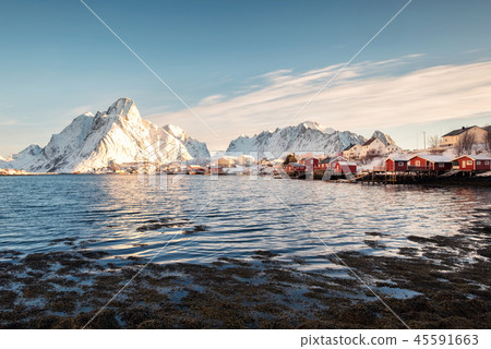 Scandinavian fishing village with snowy mountain Scandinavian fishing village with snowy mountain 45591663