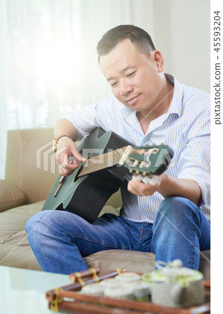 My hobby is playing guitar My hobby is playing guitar 45593204