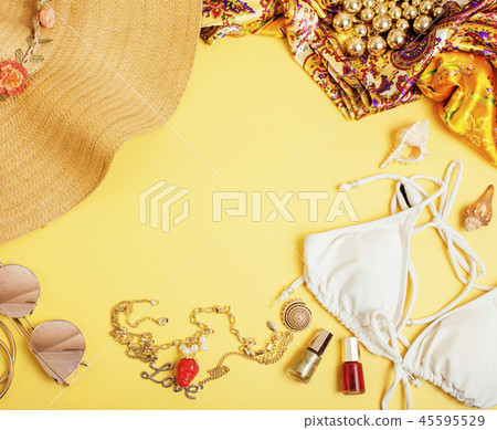 diverse travel girlish stuff on colorful background blue and yel 45595529