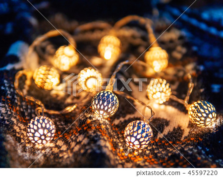 Christmas,New Year knitted pattern and light bulbs 45597220