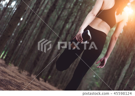 Close up of lower body of woman doing yoga 45598124
