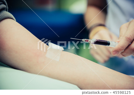Blood collecting at arm. People and Healthcare Blood collecting at arm. People and Healthcare 45598125