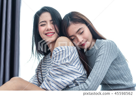 Two Asian Lesbian women hug and embracing 45598562