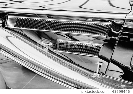 close up of the side parts on a sport vintage automobile close up of the side parts on a sport vintage automobile 45599446