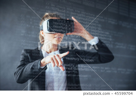The person at the board of a financial dashboard of key indicators of stock market performance and 45599704