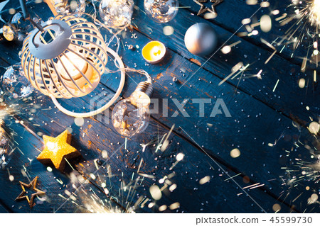 Christmas Lantern with decorations on blue wooden background 45599730
