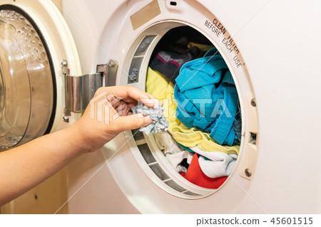 Handful of lint trapped in filter of laundry dryer Handful of lint trapped in filter of laundry dryer 45601515