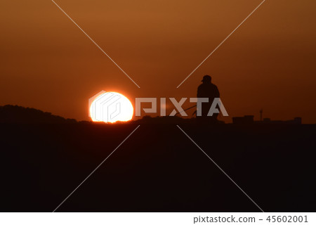 Sunset and angler 45602001