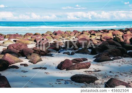 Stone on beach with the sky. Stone on beach with the sky. 45602504