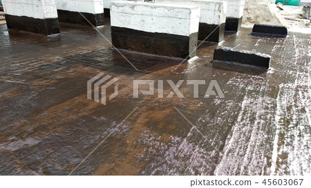 Waterproof coatings applied on flat roof concrete Waterproof coatings applied on flat roof concrete 45603067