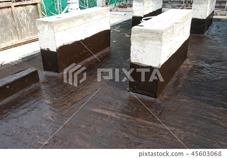 Waterproof coatings applied on flat roof concrete Waterproof coatings applied on flat roof concrete 45603068