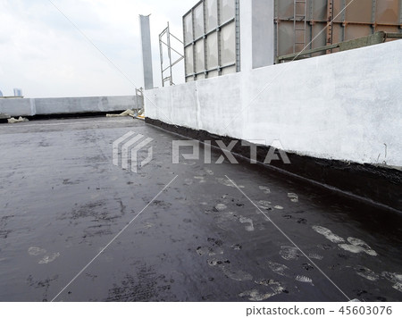 Waterproof coatings applied on flat roof concrete Waterproof coatings applied on flat roof concrete 45603076