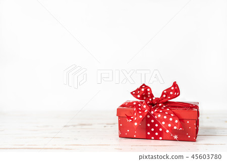Red Christmas gift box on white background Red Christmas gift box on white background 45603780