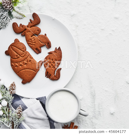 Gingerbread cookies with hot milk 45604177