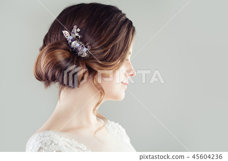 Bridal hairdo. Updo hair with hairdeco Bridal hairdo. Updo hair with hairdeco 45604236