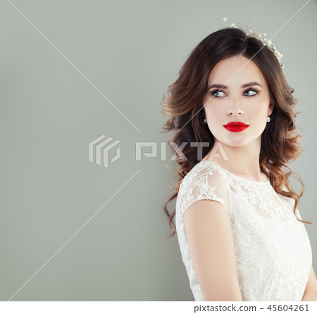 Beautiful bride with makeup and bridal hairstyle Beautiful bride with makeup and bridal hairstyle 45604261