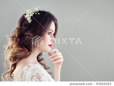 Closeup portrait of charming young woman Closeup portrait of charming young woman 45604265